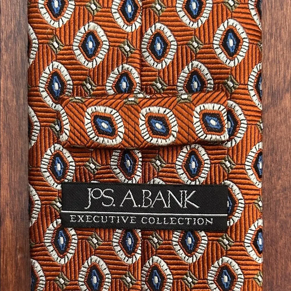 Jos. A. Bank 100% Silk Rust and Navy Woven Tie